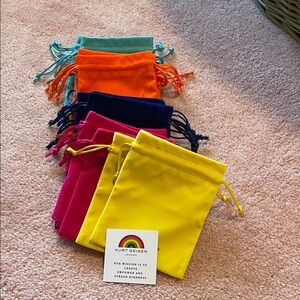 Kurt Geiger (22)Vibrant Drawstring Bags all new , I will include some cards in